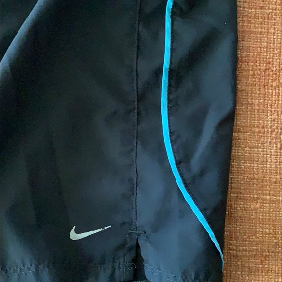 Black women’s Nike shorts with blue stripe - Picture 2 of 5